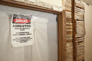 danger sign for asbestos in room