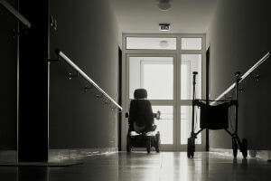 abandoned chair in dark hallway