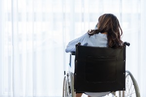 elderly woman alone in wheelchair