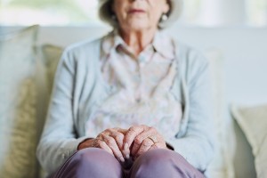 picture of elderly woman on sofa
