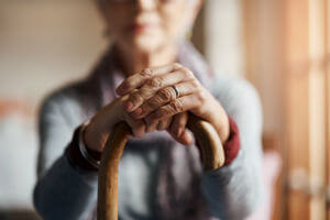 elderly woman with cane
