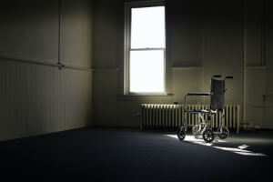 wheelchair facing a window