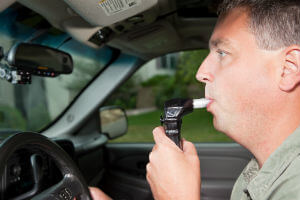 man using ignition interlock