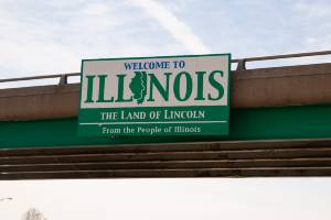 welcome to illinois sign over overpass