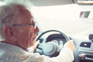 elderly driver looking ahead