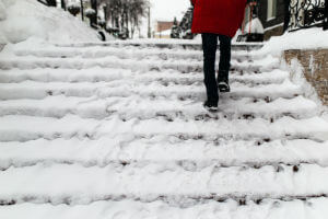 walking up a staircase in the snow