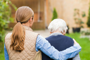 assisting an elderly person with walking