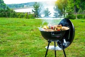 grill being used in an open field