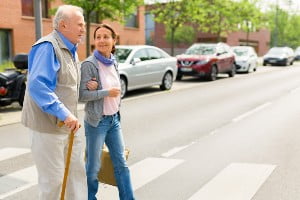 elderly person crossing street