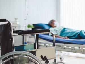 photo illustration of male nursing home resident lying in bed