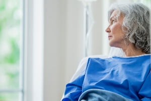 close-up stock image of an elderly woman in the hospital.