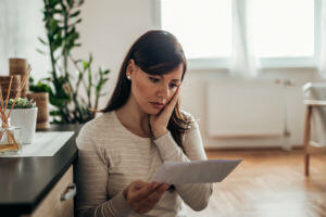 woman reading bad news