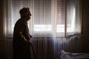 Woman in a dark room